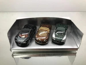 SIKU 621300702 BUGATTI VEYRON 3 SET CABRIO ETC -1:50- GOOD - 412 - Picture 1 of 5