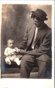 FATHER & BABY HOLD HANDS RPPC : FAMILY DYNAMICS : STUDIO PORTRAIT : 1907-1918 - Picture 1 of 3