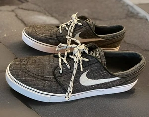 Herren 11 Nike SB Stefan Janoski Canvas Skateboard Schuhe schwarz und weiß - Bild 1 von 13