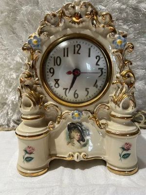 M.M. Reloj eléctrico de mesa/abrigo Co. N.Y. de porcelana con adornos de oro de 24 k Foto 1 de 4