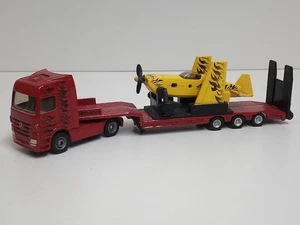 Mercedes LKW mit Sportflugzeug 1:87 Siku 1866 °TOP° #060 (3841) - Bild 1 von 5