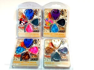 VERSCHIEDENE (3) CELLULOID GITARRENPLEKTREN UND HALTER SET - Bild 1 von 1