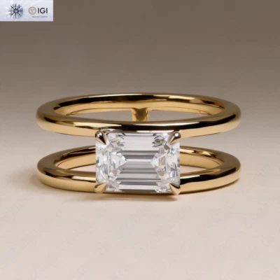 Anillo de compromiso de doble banda cultivada en laboratorio con esmeralda E VS1 1,50 quilates en oro amarillo de 14 k Foto 1 de 4