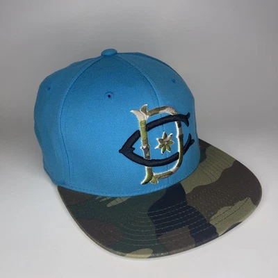 Gorra DC 210 ajustada verde azulado camuflaje billete plano Foto 1 de 4