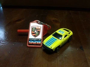 Modellino Porsche 928 Gialla con chiave meccanismo a molla with key - Imagen 1 de 1