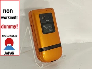 【Factice !】 Téléphone portable HITACHI W42H (couleur orange) au-japon qui ne fonctionne pas - Photo 1 sur 3