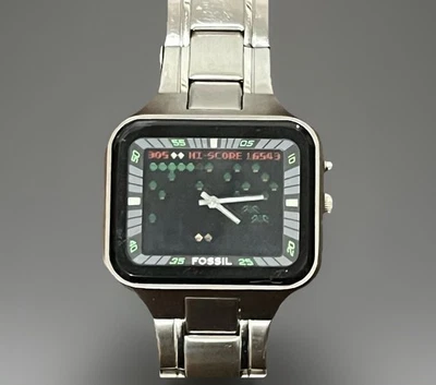Reloj animado vintage para hombre FOSSIL Big Tic ATARI ciempiés 6 1/2” acero BG-1020 Foto 1 de 4