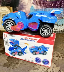 Deform Dinosaur Transforming Pop-up Car Blue Bump N Go, Sound, Lights Ages 3+ - Picture 1 of 7