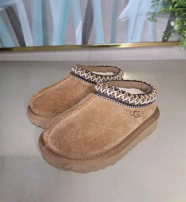 Zapatillas de piel de castaño Ugg Baby Tasman Foto 1 de 4