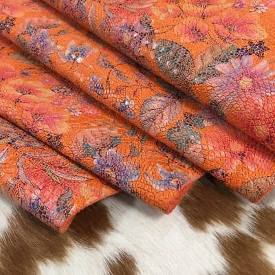 Cuero de vaca en relieve floral serpiente naranja vendido y cortado por el pie cuadrado Foto 1 de 2