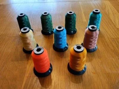 FLORIANI, 9 Spools, Opened, Minimally Used, Polyester Filament Thread  1100 yd - Image 1 of 4