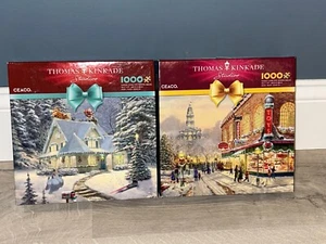 Neu 2er Set Thomas Kinkade Winter Weihnachten Puzzle 1000 Teile - Bild 1 von 1