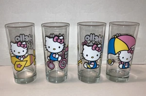 Juego de 4 vasos Hello Kitty Sanrio 2013 6 1/4" de anime coleccionable LOTE #1 - Imagen 1 de 10