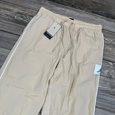 Calça de aquecimento Air Jordan Essential Statement DV7622-277 marfim deserto GRANDE NOVA - Imagem 1 de 4