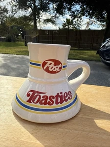 Vintage Post Toasties Gummiboden Pendler Kaffeebecher verschüttet - Bild 1 von 3