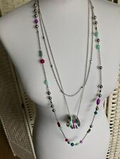 Silver multi strand layered necklace with multicolour beads and ring charms