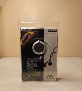 New Sealed Sony Walkman NW-E105 SILVER ( 512 MB ) Digital Music Player - Picture 1 of 5