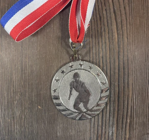 Wrestling medal medallion award on neck ribbon silver red white blue Cover