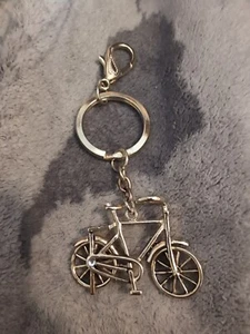 Portachiavi bicicletta con ruote mobili oro gioiello ciondolo ciondolo donna uomo chiave auto - Foto 1 di 5