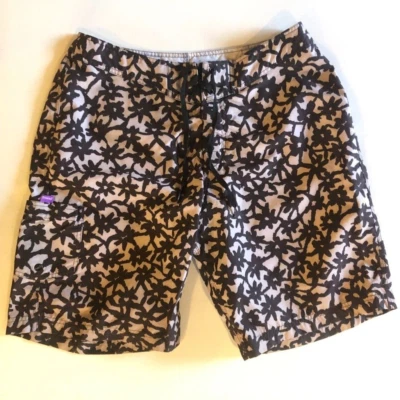 Bañador de surf vintage Stussy talla 32 negro gris estampado floral verano 2001 Foto 1 de 4