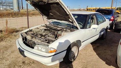 Левый передний тормозной суппорт с кронштейном для Pontiac Bonneville 1994-1999 годов выпуска - Изображение 1 из 4