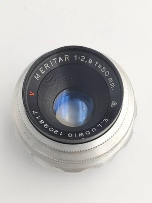 Lente E.Ludwig Meritar 50mm f2.9 Rojo V en montura Exakta hecha en Alemania. Foto 1 de 4