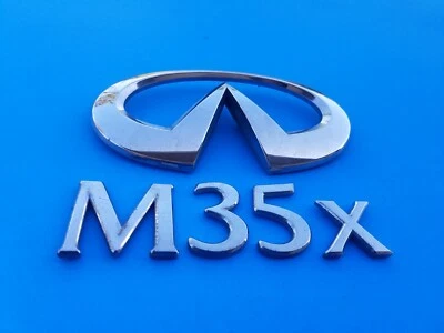 Infiniti M35X M35 X 2006 2007 2008 emblema trasero insignia símbolo logotipo conjunto fabricante de equipos originales (2007) Foto 1 de 4
