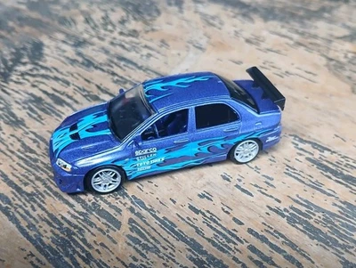 HTF Racing Champions Fast and Furious 2001 Mitsubishi Evolution VII Blue FLAMED - Image 1 of 4