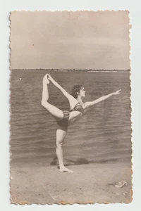 Photo Handsome Woman swimsuit stands in Yoga Tapas pose on one leg Beach VTG - Picture 1 of 2
