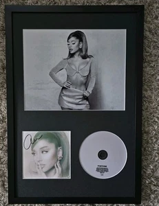 ARIANA GRANDE STAR SIGNED 12x18 FRAMED POSITIONS CD FROM WEBSITE - Picture 1 of 1