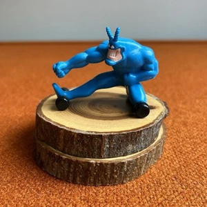 Vintage 1995 The Tick Power Roller Taco Bell Kinder Mahlzeit Spielzeug blau 2”x2.5” Figur - Bild 1 von 7
