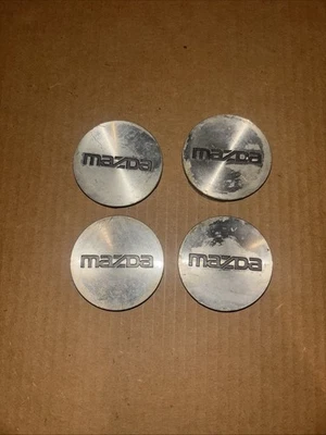 Tapa central llanta de metal para llanta Mazda 1990-95 929 MPV pieza original OEM 64731 Foto 1 de 2