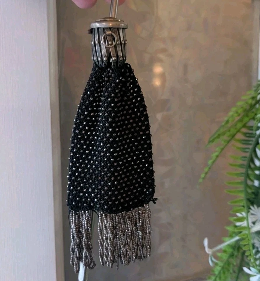 Cuello puerta monedero Miser's Foto 1 de 4