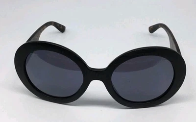 Gafas de sol redondas negras vintage con brazos de carey - estilo retro de calle Foto 1 de 4