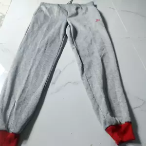 PUMA NEW Red logo cuffed Tapered Jogger Sweat Pants Kids - Picture 1 of 5