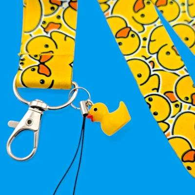 CORDÓN DE PATITO DE GOMA AMARILLA juguete de pato encanto de plástico correa para el cuello llavero Y2 Foto 1 de 4