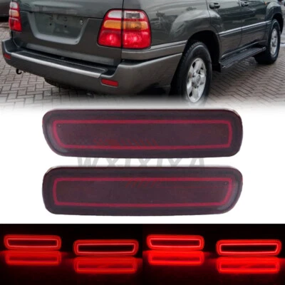 Lámpara de luz trasera LED para parachoques para Toyota Land Cruiser 1998-07 con lente roja giratoria Foto 1 de 4