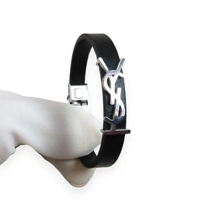 Bracelet fantaisie promotionnel YSL Vintage de couleur noire et logo Argenté - Picture 1 of 9