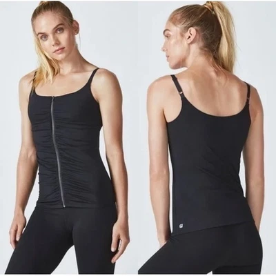 Camiseta sin mangas Fabletics negra acanalada con cremallera frontal sin mangas ropa deportiva mediana Foto 1 de 4