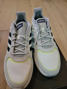 adidas Men's 90s Valasion Sneaker,Cloud White/Dark Blue/hi-res Yellow, 10.5 M US - Picture 1 of 7