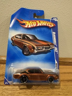 Muscle Mania Oldsmobile 442 2009 marrón 082/190 Hot Wheels Foto 1 de 2