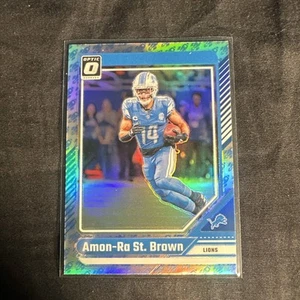 2024 Donruss Optic Rocket Ship Emoji Holo SSP Amon-Ra St Brown Lions #66 - Picture 1 of 2