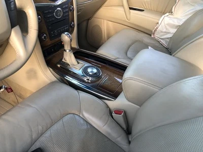 Infiniti QX56 2011 2012 2013 piso consola central bronceado reposabrazos portavasos 955902 Foto 1 de 4