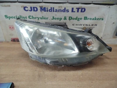 Faro delantero derecho lado del conductor Nissan NV200 2011 26010-BJ00A Foto 1 de 4