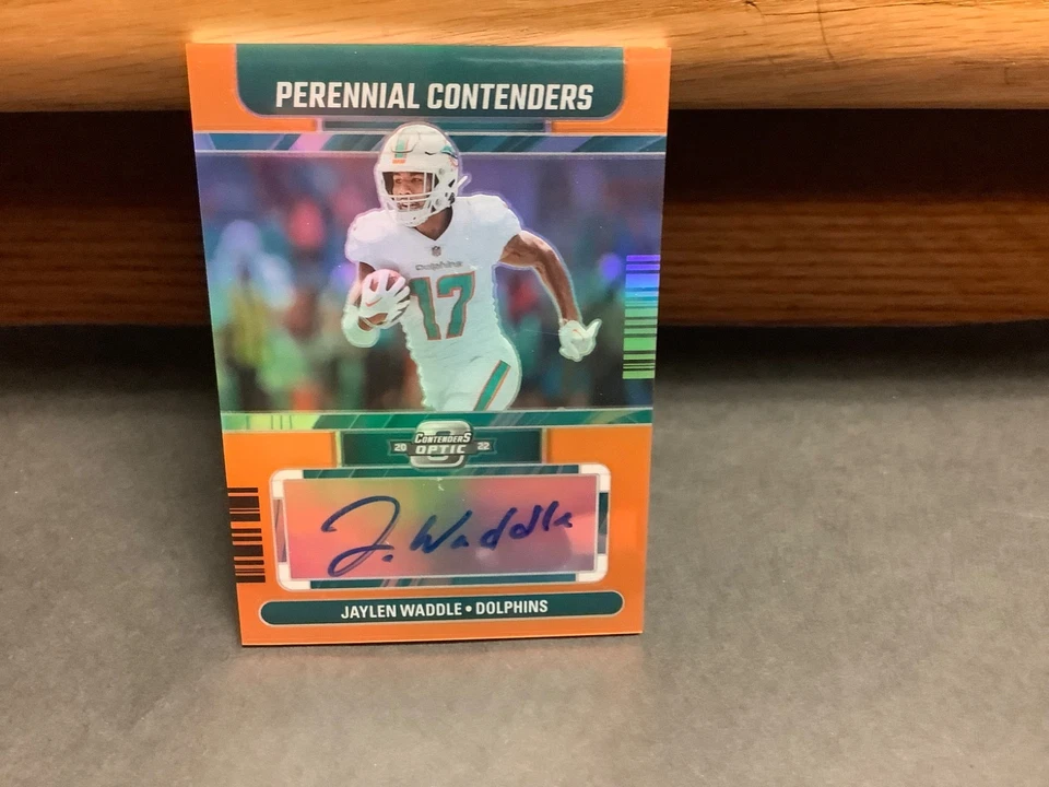 2022 Panini Contenders Optic Perennial Jaylen Waddle Auto /35 - Image 1 of 2