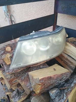 2005  2006 2007 2008 2009 Saab 9-7X Headlight Halogen Left / Driver Side - Image 1 of 4