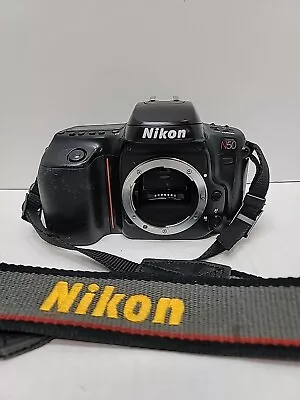 NIKON N50 35mm FILM CAMERA BODY ONLY BLACK WITH NIKON STRAP  - Image 1 of 4