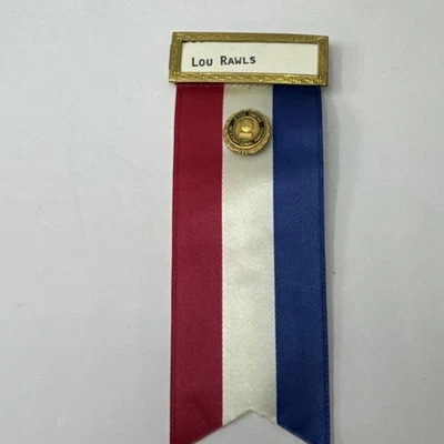 RARE VINTAGE JESSE OWENS OLYMPICS INTERNATIONAL AWARD PIN FROM LOU RAWLS ESTATE - Image 1 of 4