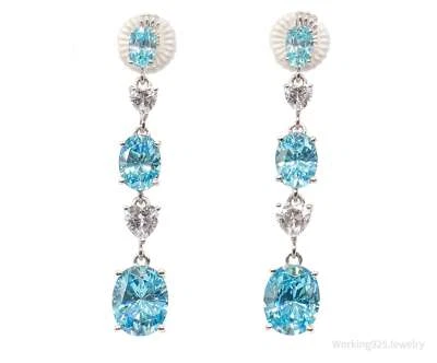 Pendientes Jean Dousset de plata de ley revestidos de platino con circonitas cúbicas azules y blancas Foto 1 de 4