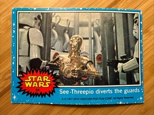 B1G1 25% Off • 1977 Star Wars - Series 1 (Blue) #34 • See-Threepio diverts guard - Picture 1 of 3